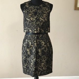 Black and gold sleeveless dress with crop top